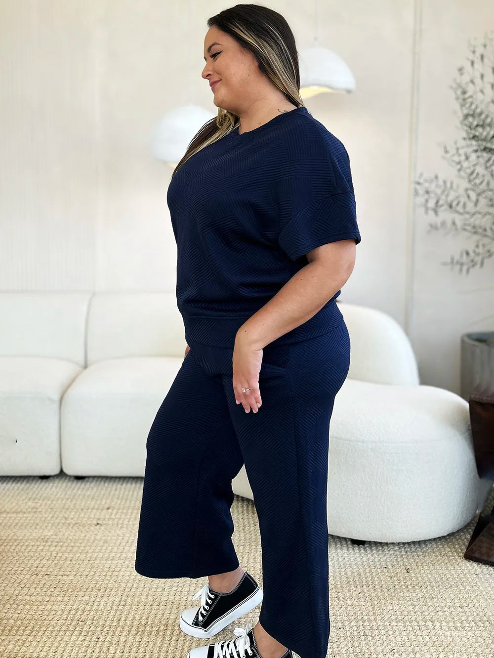 Trendsi Double Take full size texture short sleeve top and matching pants set, featuring a stylish pattern and comfortable fit.