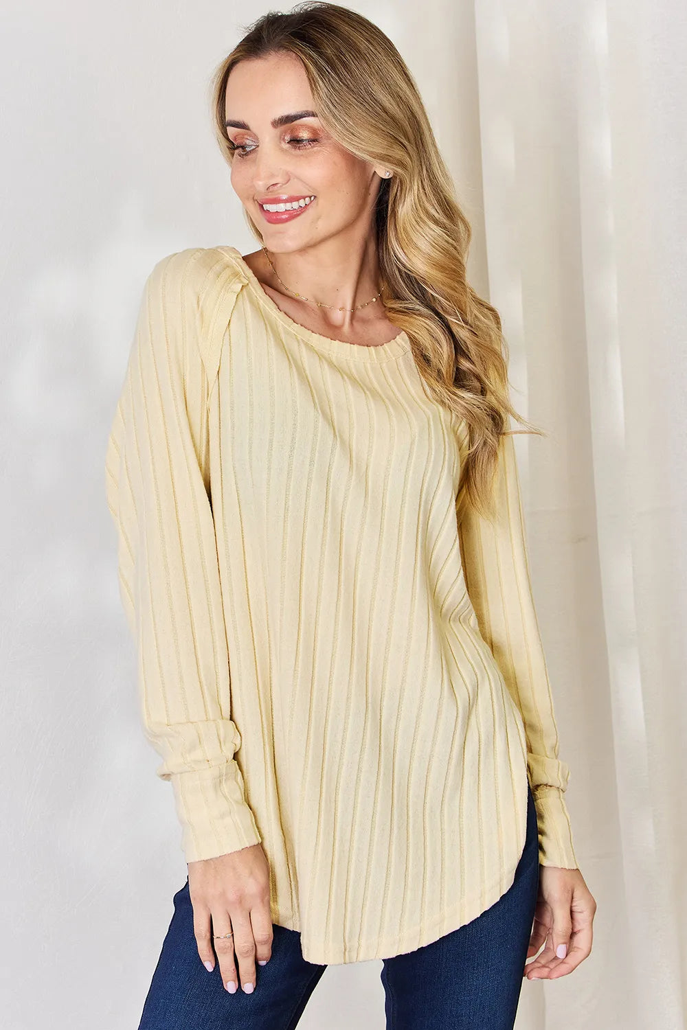 Trendsi Basic Bae full size ribbed round neck slit T-shirt in neutral color, featuring a ribbed texture and stylish slit detail.