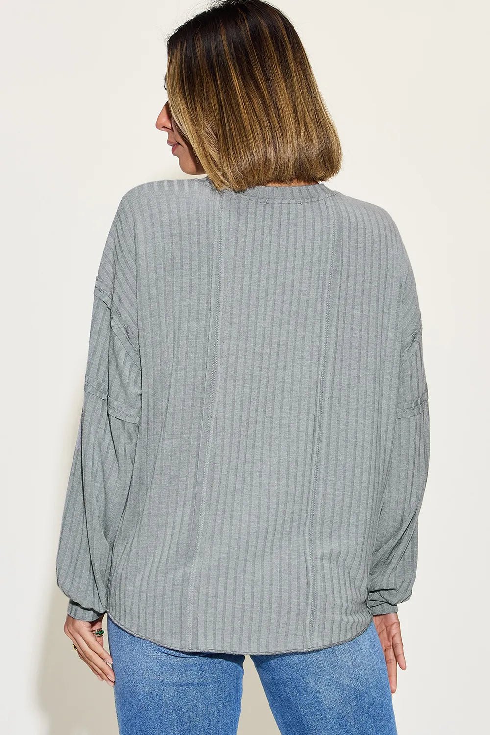 Basic Bae ribbed long sleeve T-shirt by Trendsi, featuring a round neckline and fitted ribbed fabric in a full size.