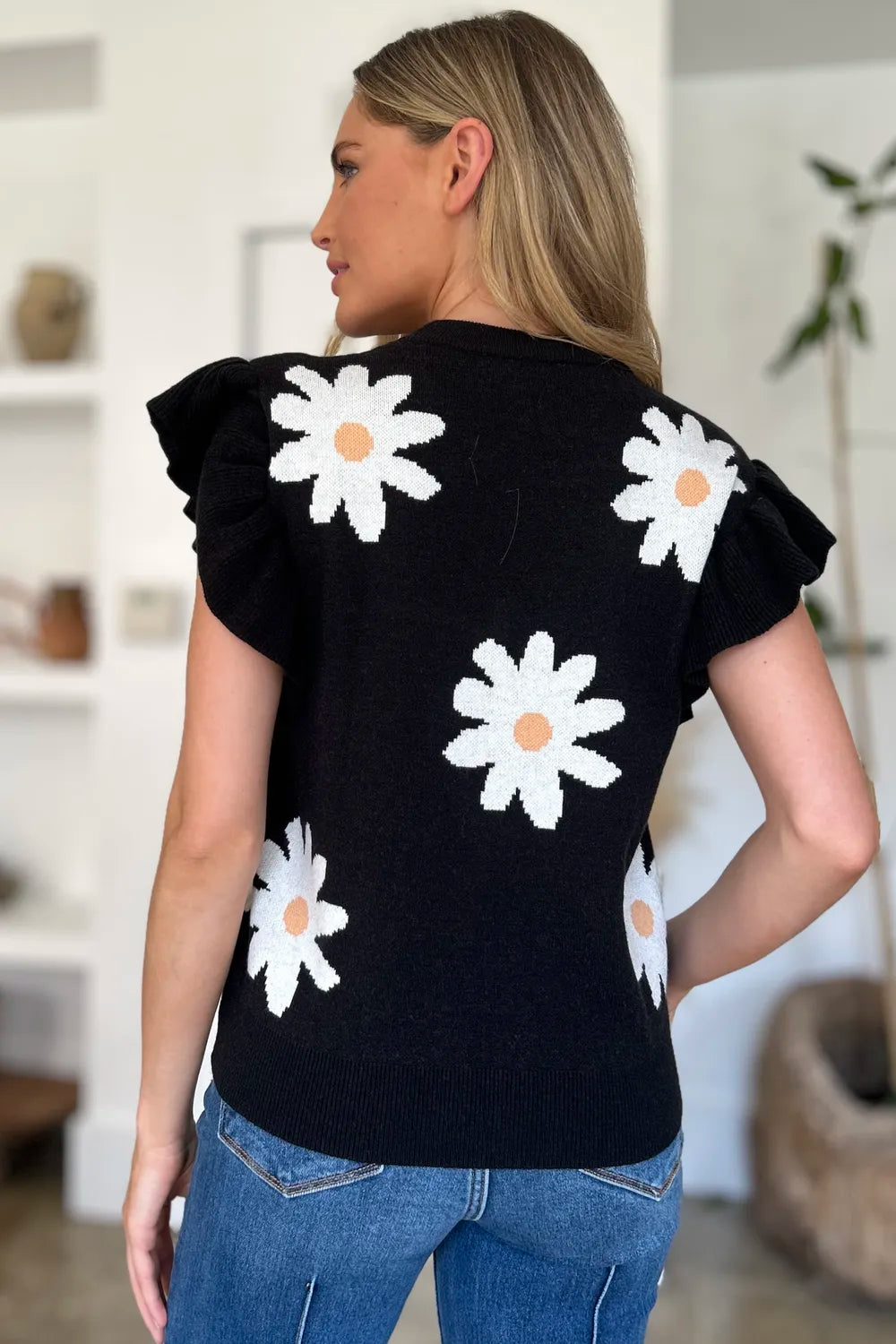 Trendsi double take full size ruffled flower round neck cap sleeve sweater showing floral design and ruffled details.