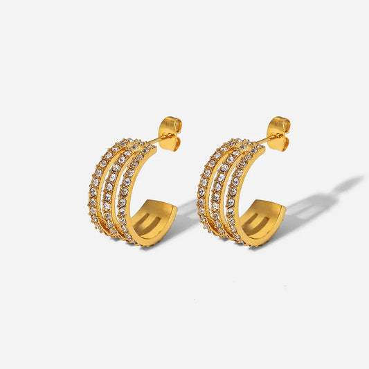 Stainless steel inlaid zircon C-hoop earrings with sparkling stones and sleek design, showcasing trendy jewelry style.