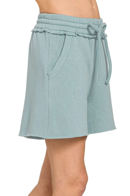 Zenana fleece raw hem shorts with drawstring, casual loungewear featuring soft fabric and relaxed fit, shown in the image.