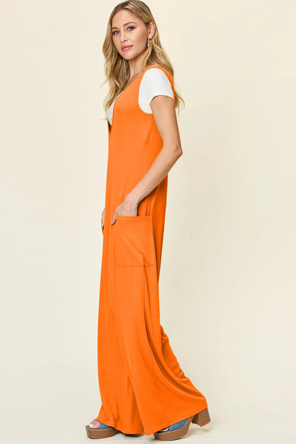 Plus size Trendsi double take sleeveless wide leg jumpsuit with pockets, full length, stylish and comfortable for casual wear