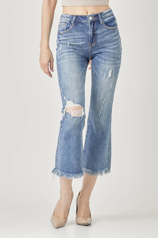 Trendsi RISEN high waist distressed cropped bootcut jeans displayed on a model, showing front view with ripped details and faded wash.