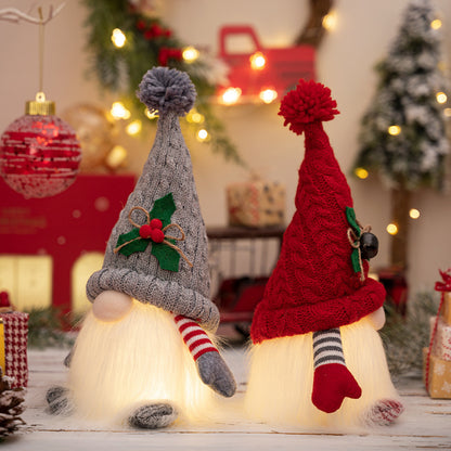 Faceless gnome figurine with short legs and light-up feature, styled in a whimsical design by Trendsi.