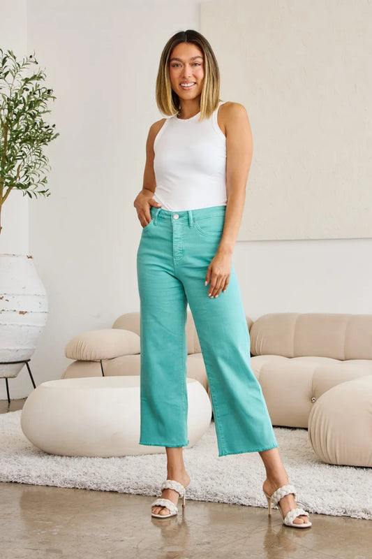 RFM Crop Chloe high waist tummy control raw hem jeans by Trendsi, featuring a full size fit and distressed raw hem detail.