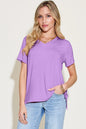 Basic Bae Bamboo full-size V-neck high-low T-shirt by Trendsi, shown in a natural fit with bamboo fabric and V-neck style.