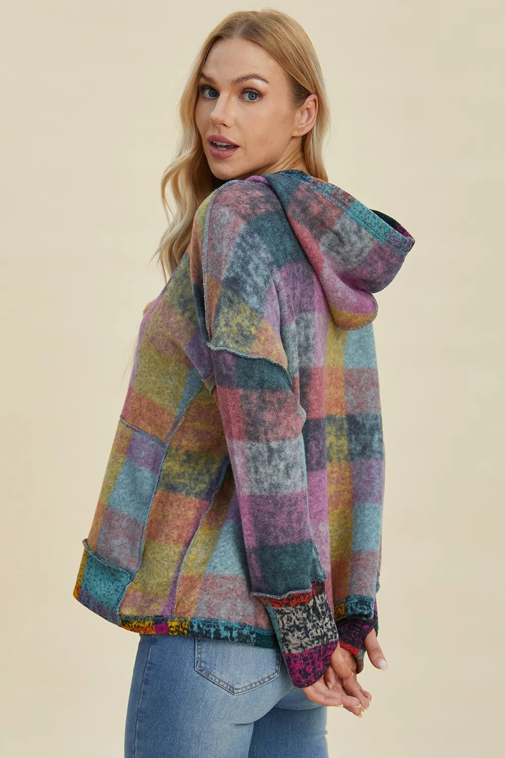 Plus size plaid fleece hoodie with dropped shoulders from Trendsi, featuring a cozy double take full size design and casual fit.