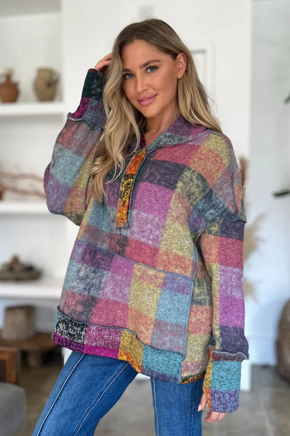 Plus size plaid fleece hoodie with dropped shoulders from Trendsi, featuring a cozy, relaxed fit and stylish double take design.