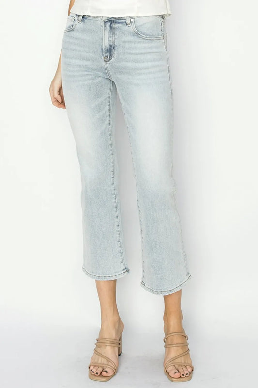 Risen full size mid-rise cropped flare jeans from Trendsi, featuring a fashionable fit and stylish design, shown in the image.