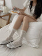 Lace fishnet mid-calf socks by Trendsi featuring delicate lace and intricate fishnet pattern, perfect for stylish legwear.