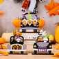 Three Halloween-themed car-shaped ornaments in black, orange, and white with festive designs, ideal for decorating vehicles.