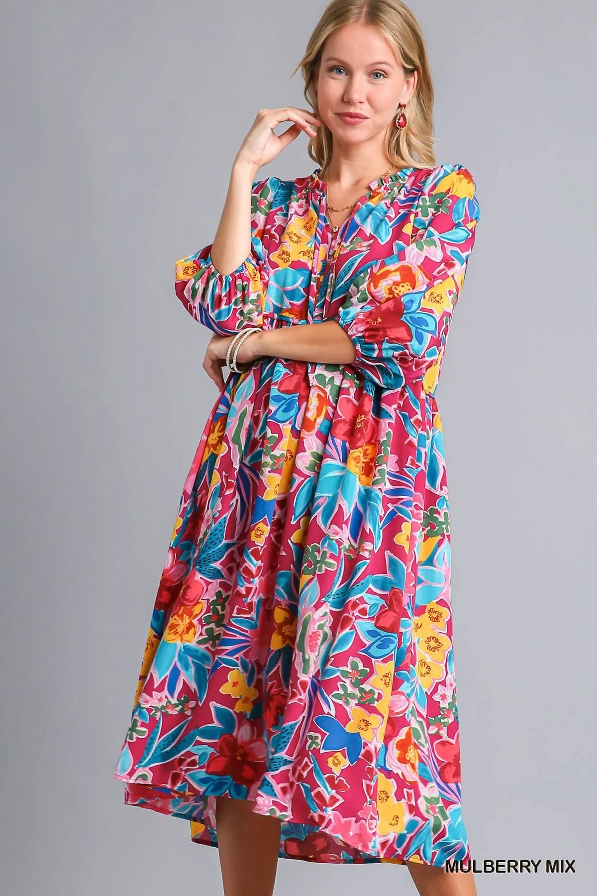 Plus size floral print tie neck midi dress with pockets by Umgee, featuring a feminine design and full-length sleeves.