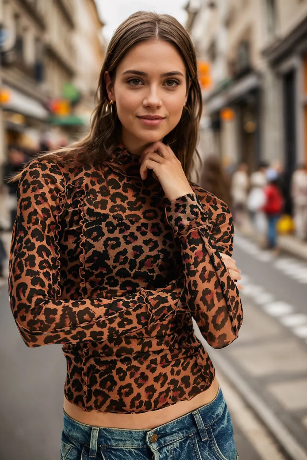 Oh Full Size Frill Printed Mock Neck Long Sleeve Top by Trendsi, featuring a stylish printed design and ruffled details on the sleeves.