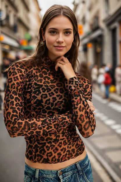 Oh Full Size Frill Printed Mock Neck Long Sleeve Top by Trendsi, featuring a stylish printed design and ruffled details on the sleeves.