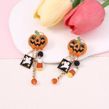 Halloween Pumpkin Ghost Dangle Earrings featuring orange pumpkin and ghost charms, trendy jewelry by Trendsi.
