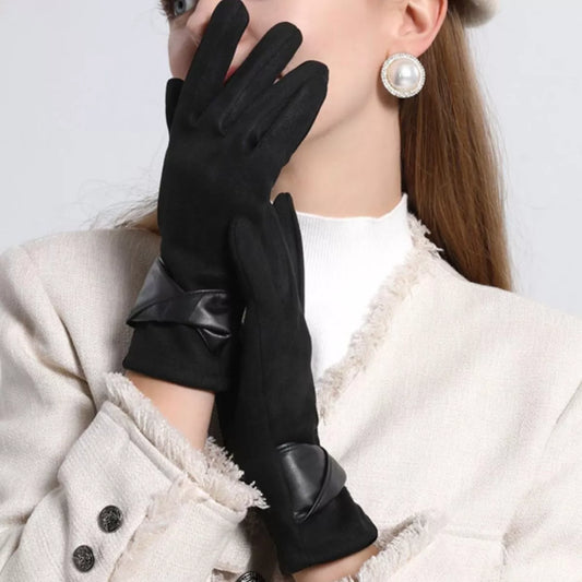 Warm leather-trimmed suede gloves showing soft suede material and stylish leather accents on the cuffs.