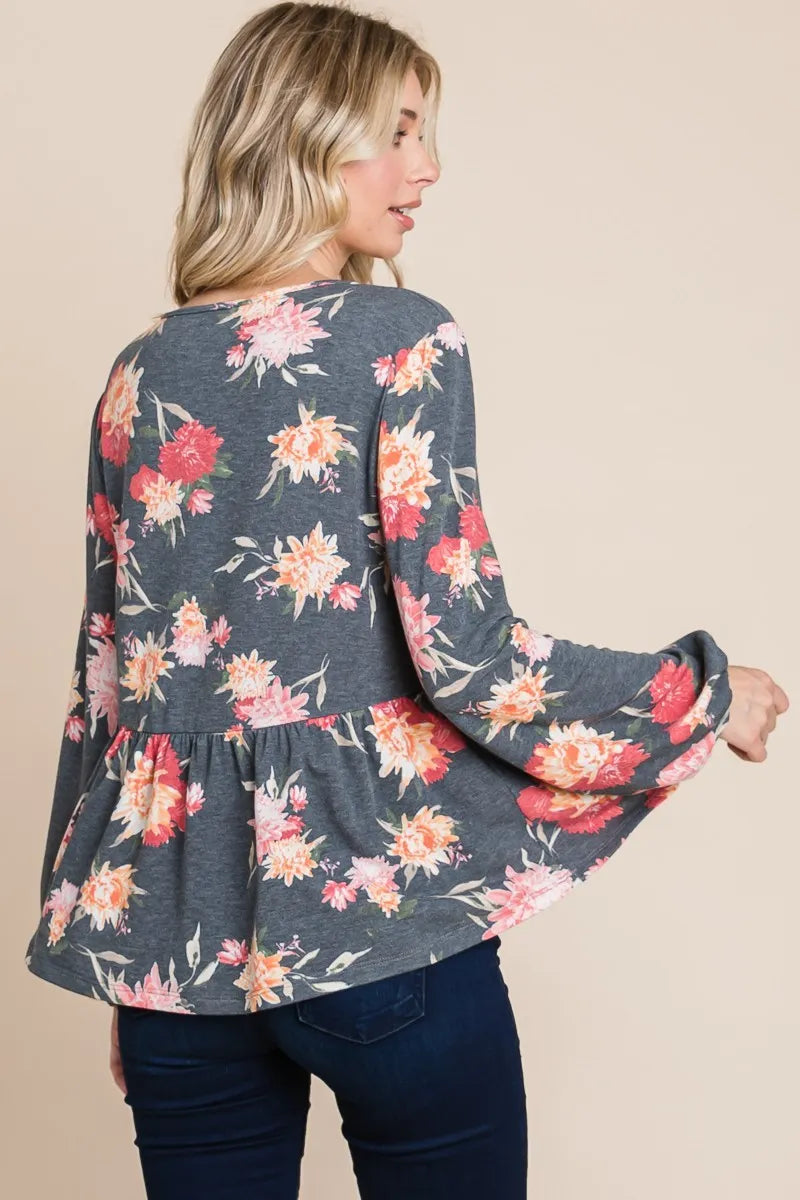 Super Lady floral long sleeve babydoll blouse by Trendsi, featuring a full-size feminine blouse with delicate floral print.