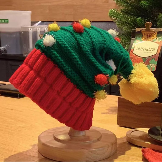 Red Christmas knitted beanie hat by Trendsi with festive patterns, cozy and warm for holiday wear.