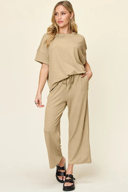Trendsi double take full size texture round neck short sleeve T-shirt with wide-leg pants, casual stylish outfit for women.