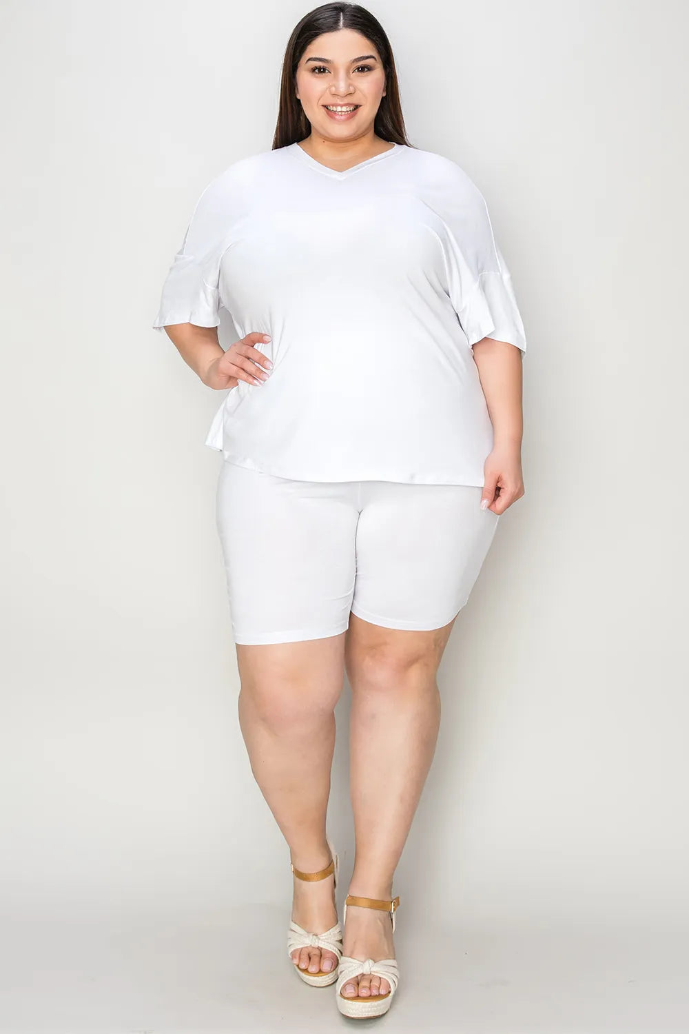 Basic Bae Bamboo V-neck T-shirt and shorts set by Trendsi, featuring a relaxed fit, drop shoulders, and sustainable bamboo fabric.