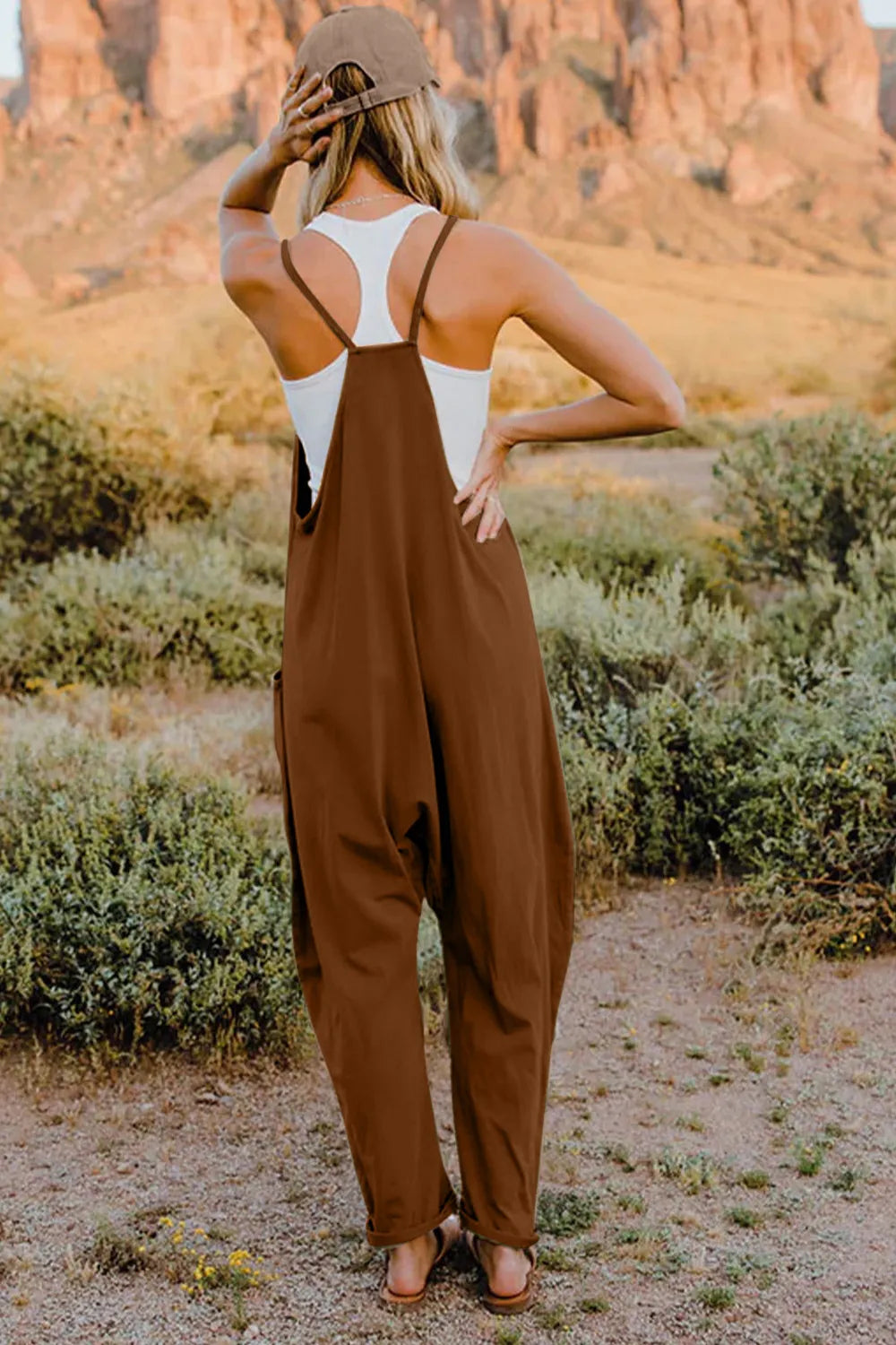 Trendsi Double Take full-size sleeveless v-neck jumpsuit with pockets, stylish and comfortable for casual wear.