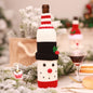 Christmas knit wine bottle cover from Trendsi featuring festive red and white yarn with a cozy holiday design.