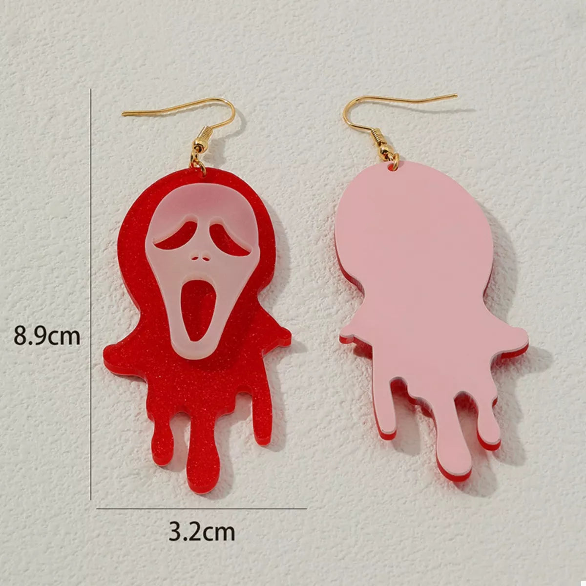 Halloween Ghost Scream dangle earrings featuring spooky ghost design, trendy jewelry by Trendsi for festive Halloween accessories.