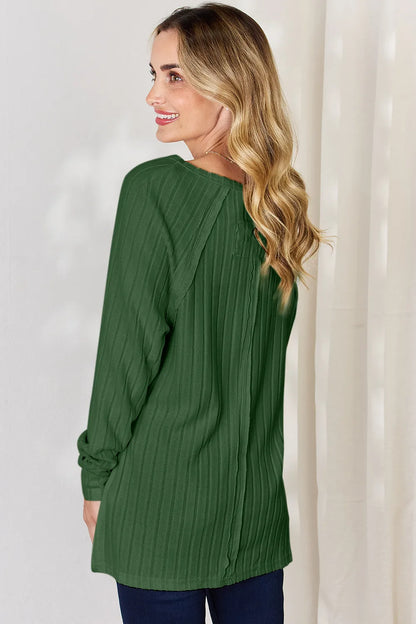 Basic Bae ribbed round neck slit T-shirt by Trendsi, shown in a full size, with a ribbed texture and a stylish slit design.