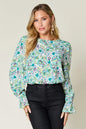 Printed flounce sleeve blouse from Trendsi, featuring double take full size design and stylish sleeve details.