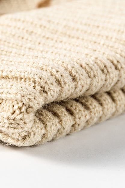 Leopard print pom-pom cuffed beanie by Trendsi featuring a cozy knit design with playful leopard pattern and fluffy pom-pom detail.