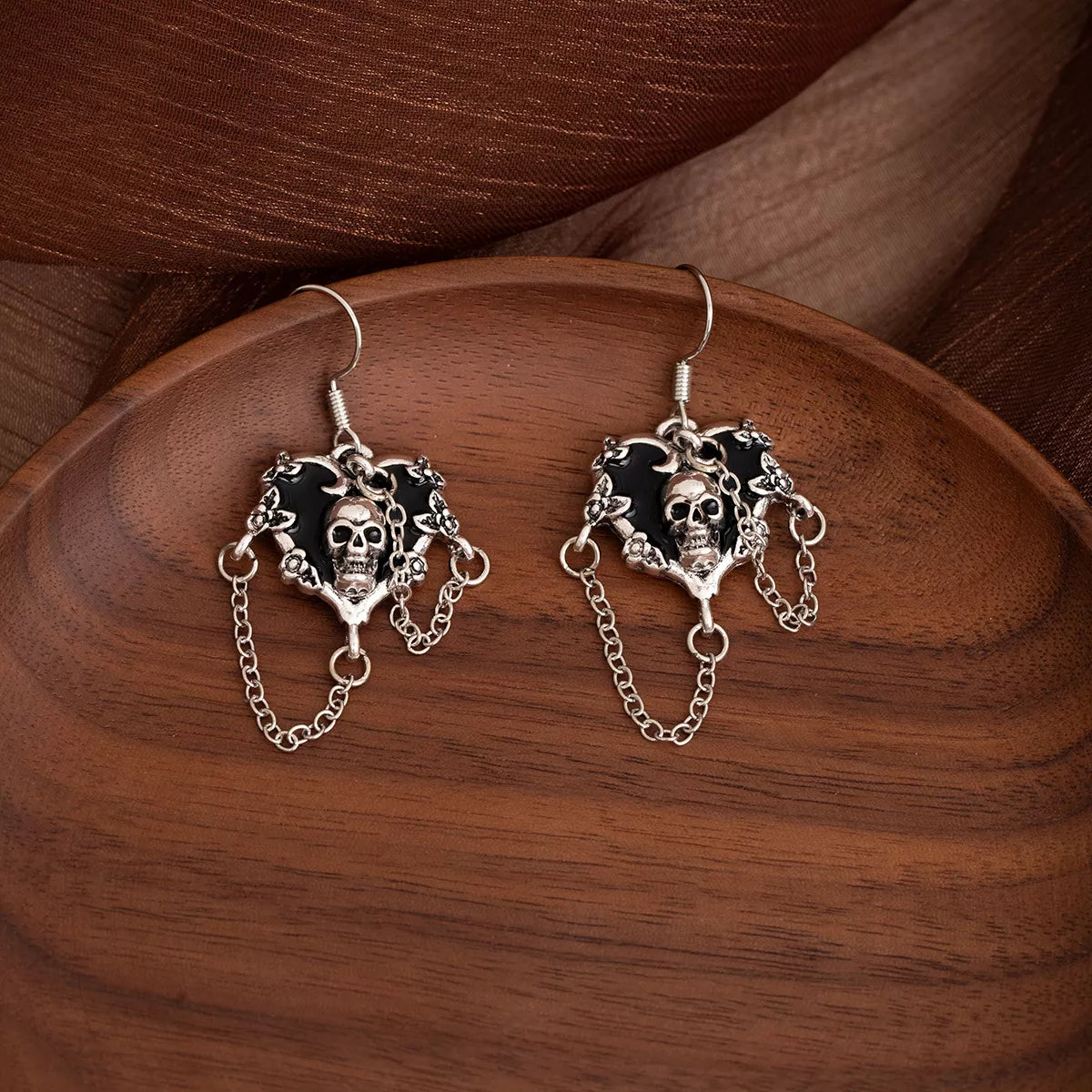 Halloween alloy heart skull earrings with chain detail, featuring gothic design and intricate metalwork, perfect for Halloween accessories.