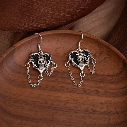 Halloween alloy heart skull earrings with chain detail, featuring gothic design and intricate metalwork, perfect for Halloween accessories.