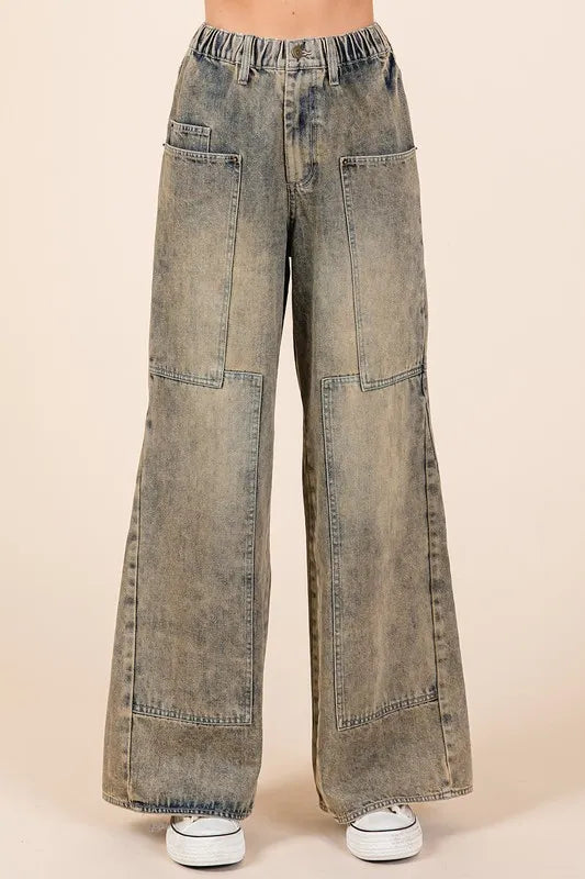 Washed wide-leg jeans by Mittoshop with front and back pockets, relaxed fit, denim texture, casual style, trendy fashion.