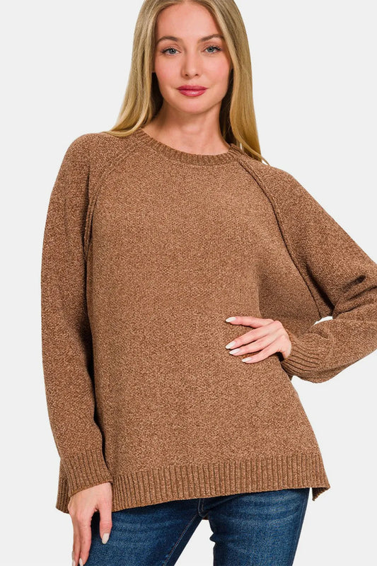 Zenana side slit raglan sleeve sweater in soft knit fabric with relaxed fit and stylish design, shown in a neutral color.