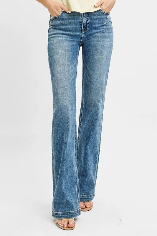 Plus size RISEN bootcut jeans with distressed details, denim fabric, and classic fit, by Trendsi.
