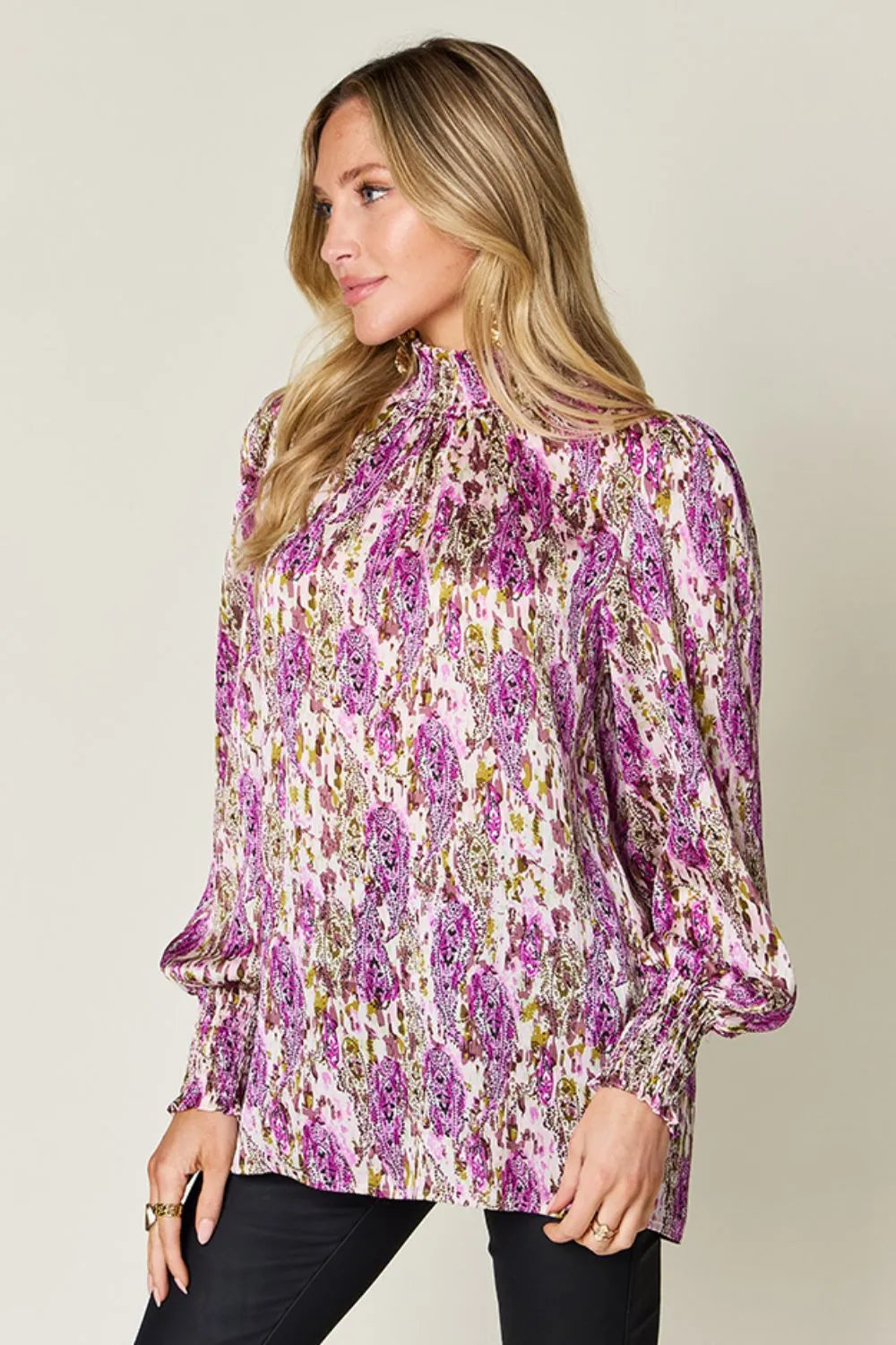 Printed smocked long sleeve blouse from Trendsi featuring a double take full size design and detailed fabric patterns.