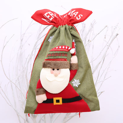 Red drawstring Christmas gift bag with festive holiday design, made of durable fabric, perfect for wrapping presents during the holiday season.