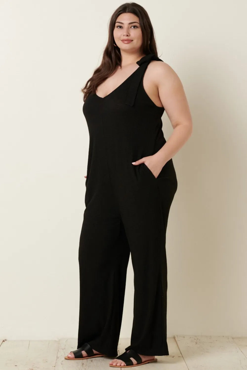 Rib knit V-neck cross back jumpsuit by Mittoshop featuring a fitted design and stylish back cross detail.