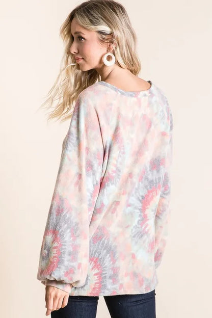 BiBi brushed tie dye print top with puff sleeves, trendy fashion top by Trendsi, featuring vibrant colors and stylish design.