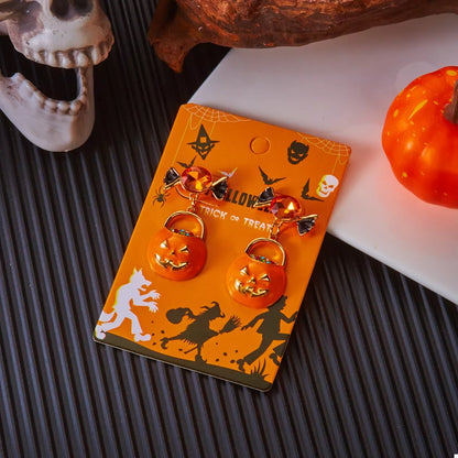 Halloween Rhinestone Pumpkin Dangle Earrings with sparkling details and festive pumpkin design, perfect for Halloween accessories.