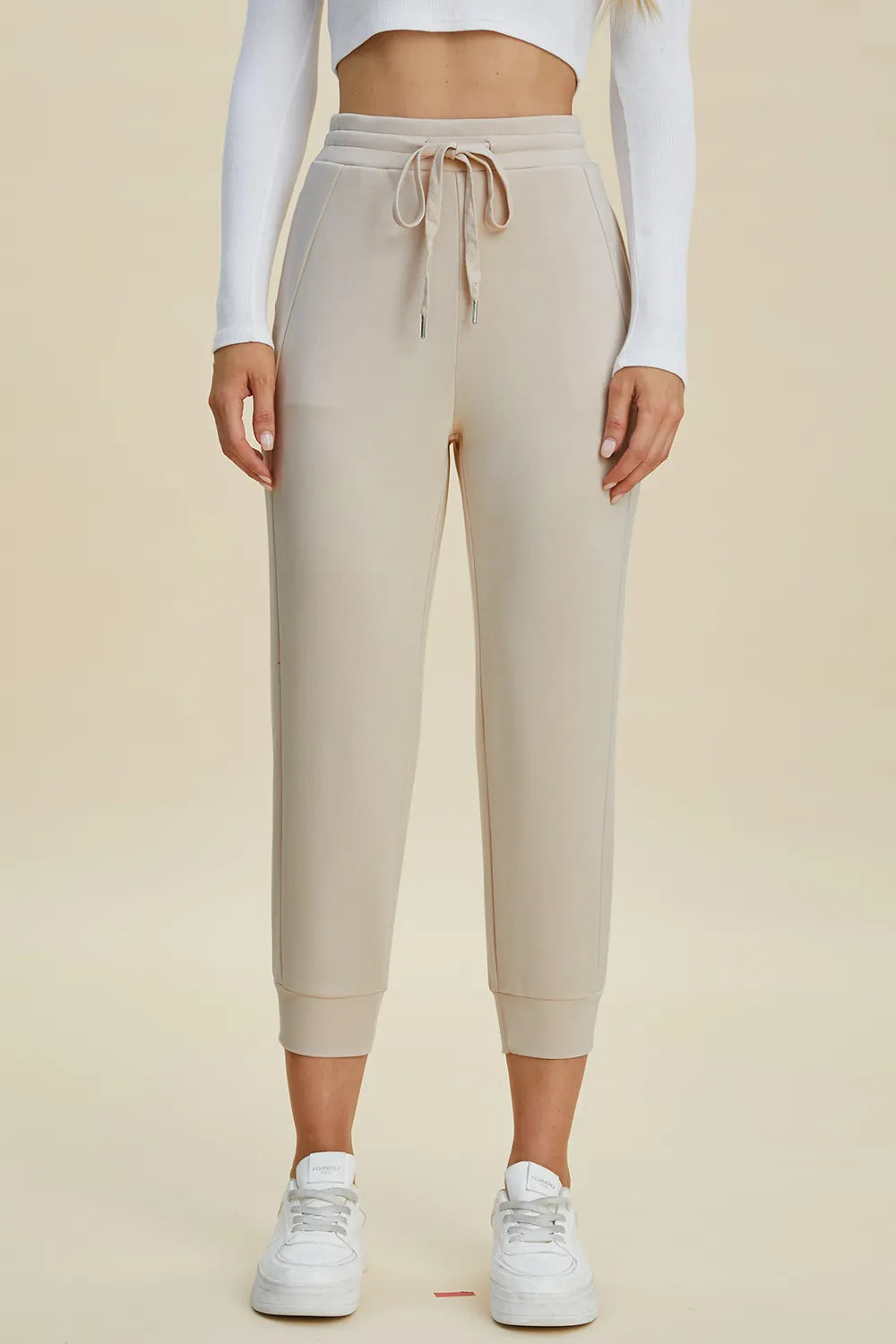 Black high waist cropped scuba pants with drawstring, from Trendsi's Basic Bae collection, featuring a full-size air scuba fabric.