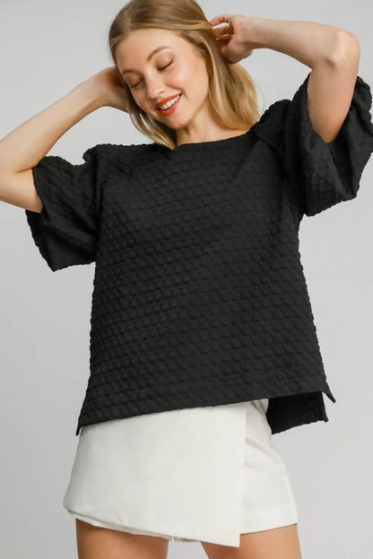 Plus size Umgee boxy jacquard top with round neck and side slit, featuring a stylish full-size fit and textured fabric.