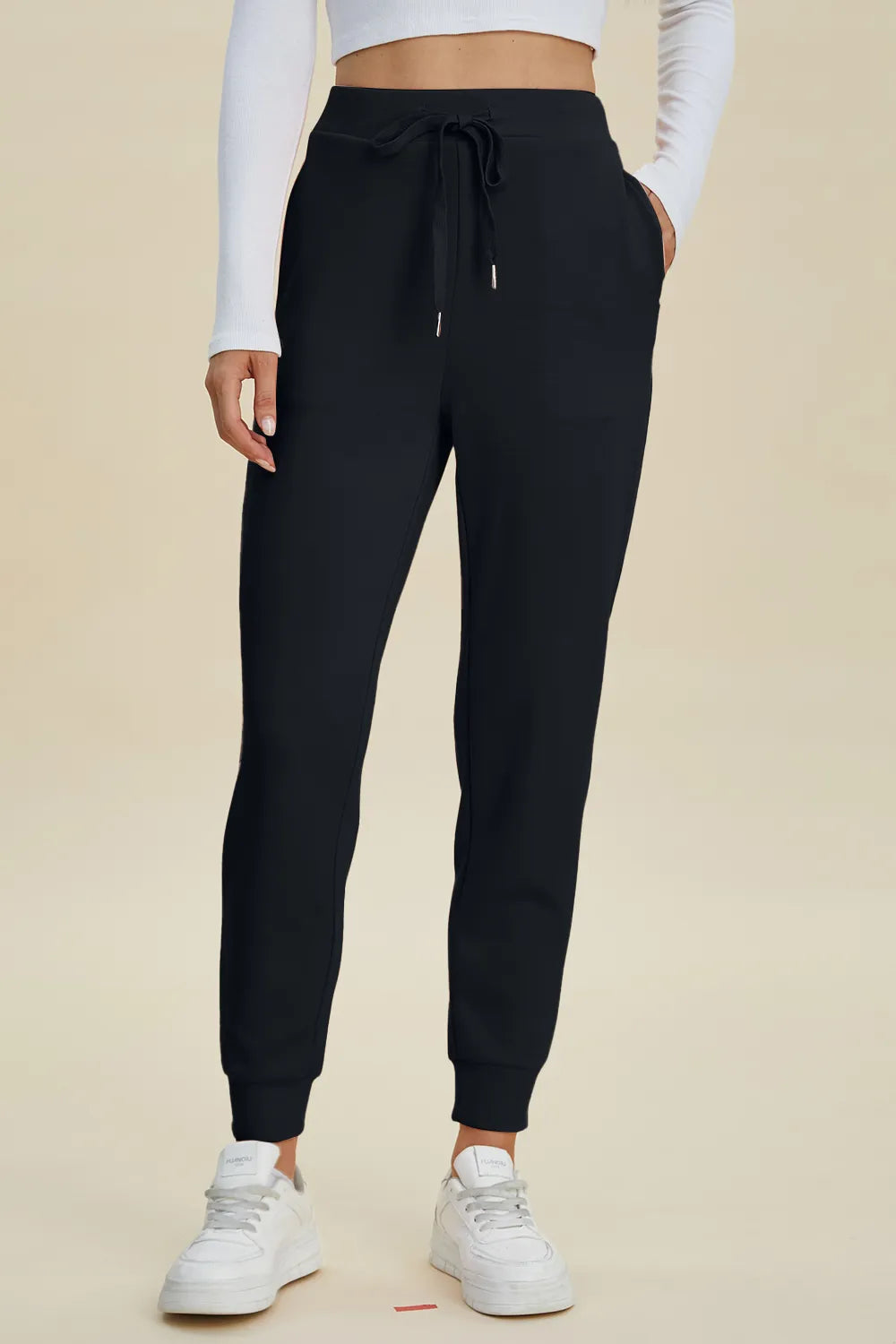 Basic Bae full size air scuba high waist joggers by Trendsi, featuring drawstring waistband and comfortable fit in lightweight fabric.