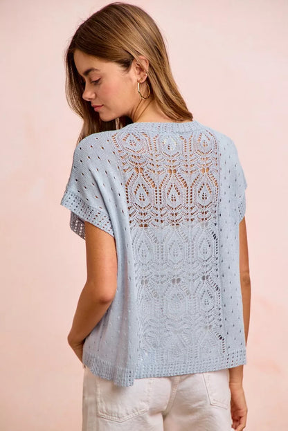 Light blue BiBi Washed Eyelet short sleeve knit top from Trendsi, featuring breathable fabric and eyelet detailing.
