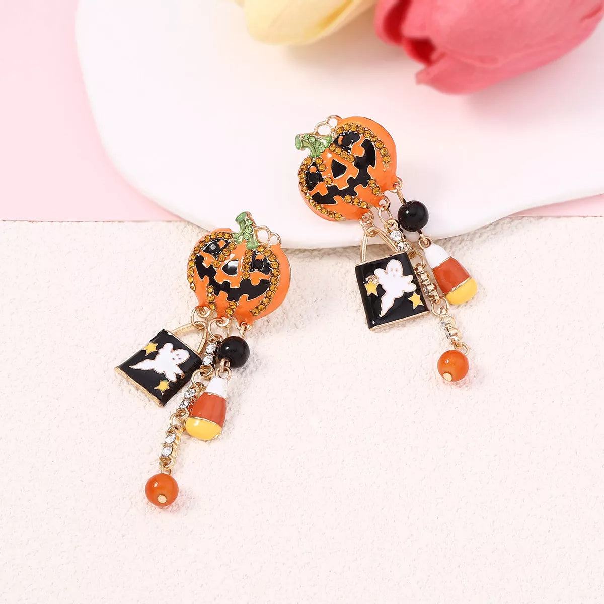 Halloween Pumpkin Ghost dangle earrings featuring orange pumpkin and spooky ghost charms, trendy jewelry by Trendsi
