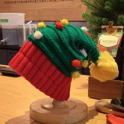 Christmas knitted beanie hat by Trendsi featuring festive red and white patterns, cozy wool blend, and ribbed cuff design.
