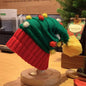 Christmas knitted beanie hat by Trendsi featuring festive red and white patterns, cozy wool blend, and ribbed cuff design.