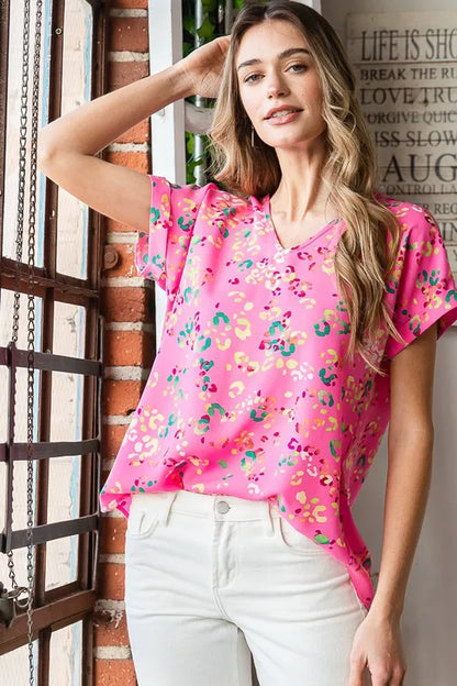 Heimish full size animal print V-neck short sleeve T-shirt from Trendsi, plus size with stylish animal pattern and comfortable fit.