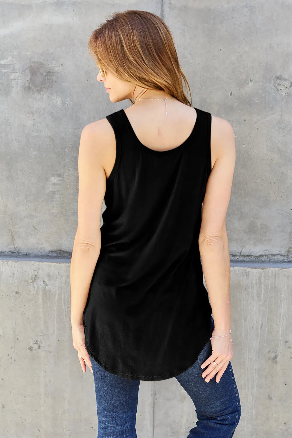 Basic Bae Bamboo full size round neck tank top by Trendsi, showing a natural beige bamboo fabric tank with a round neckline.